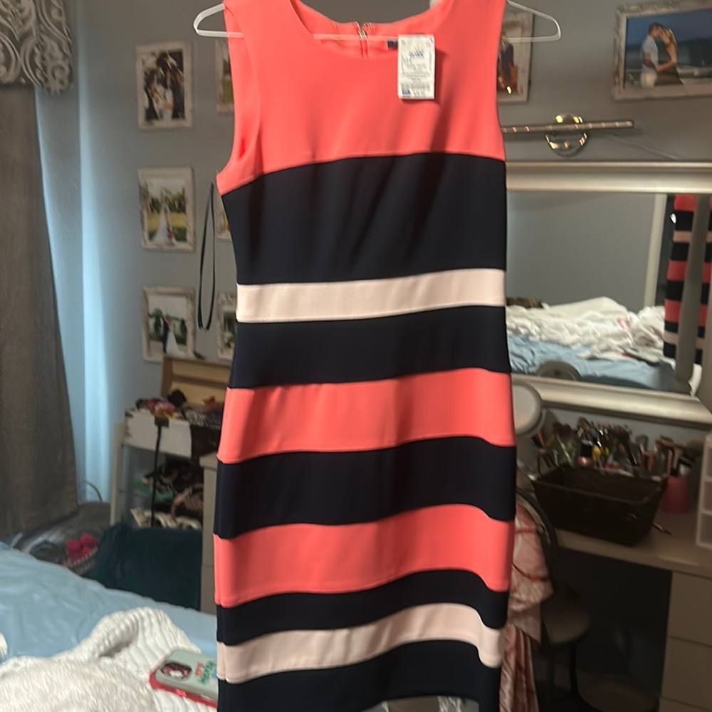 Never worn, doesn’t fit